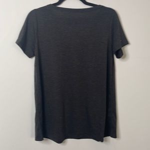 oversized top with details at the back